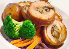 Chicken stuffed and sliced with vegetables