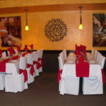 Tables set with decorative cloths and napkins