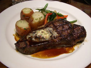 Steak and Potatoes with Au Jus and Vegetables